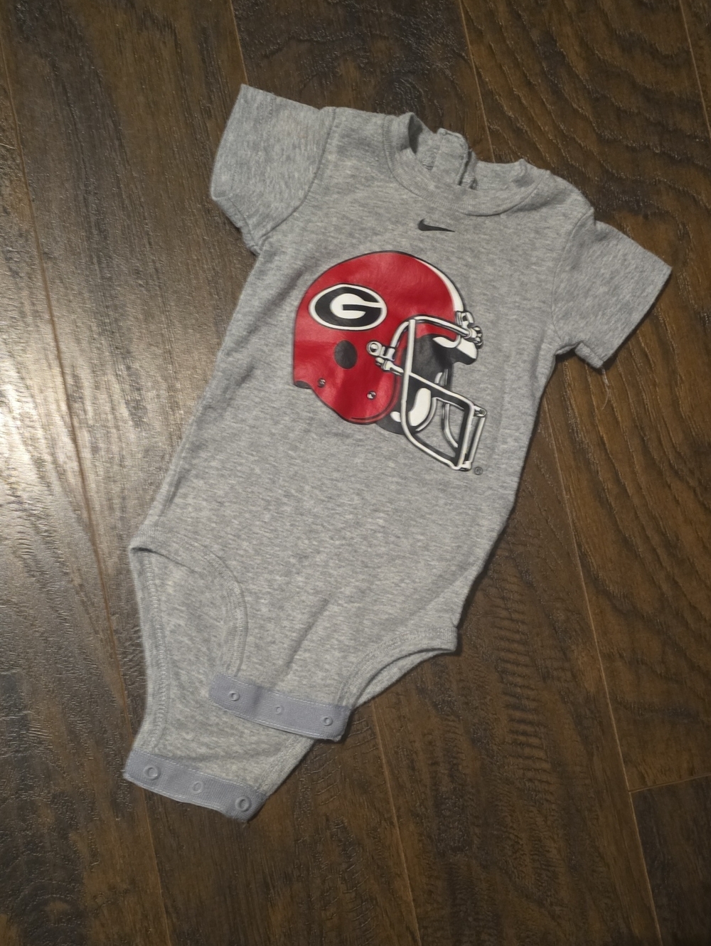 Georgia Bulldog Nike Grey Baby Bodysuit.